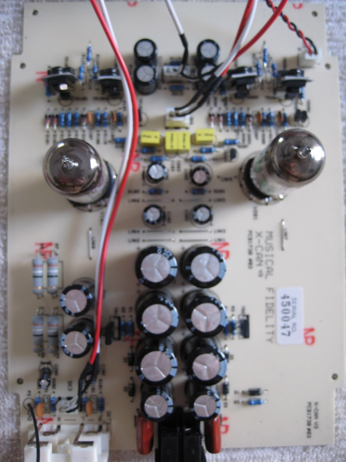 Question about popping sound from headphones when plugging into amps